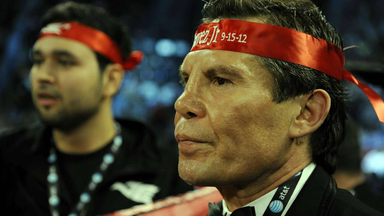 Julio Cesar Chavez Watching A Match