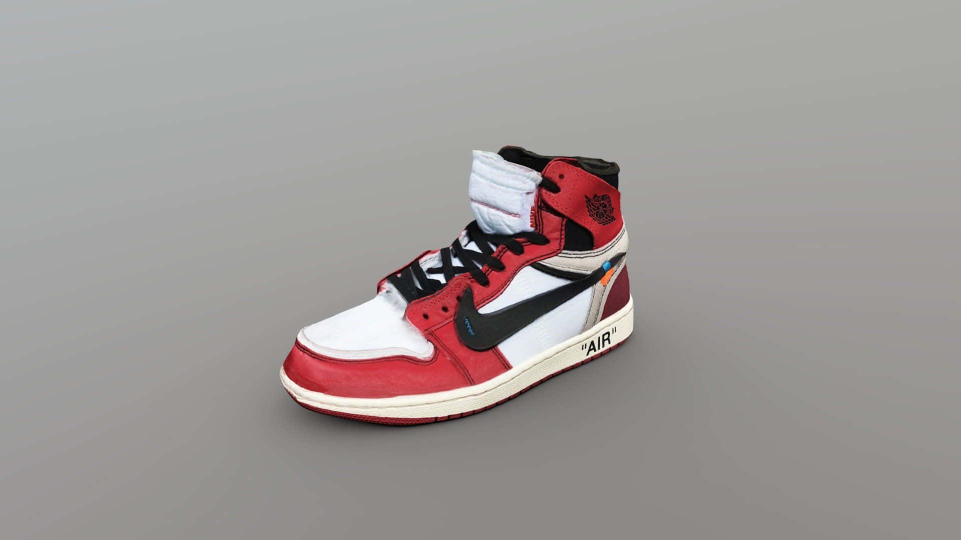 Jump High And Stand Out With Red Jordan Shoes. Background