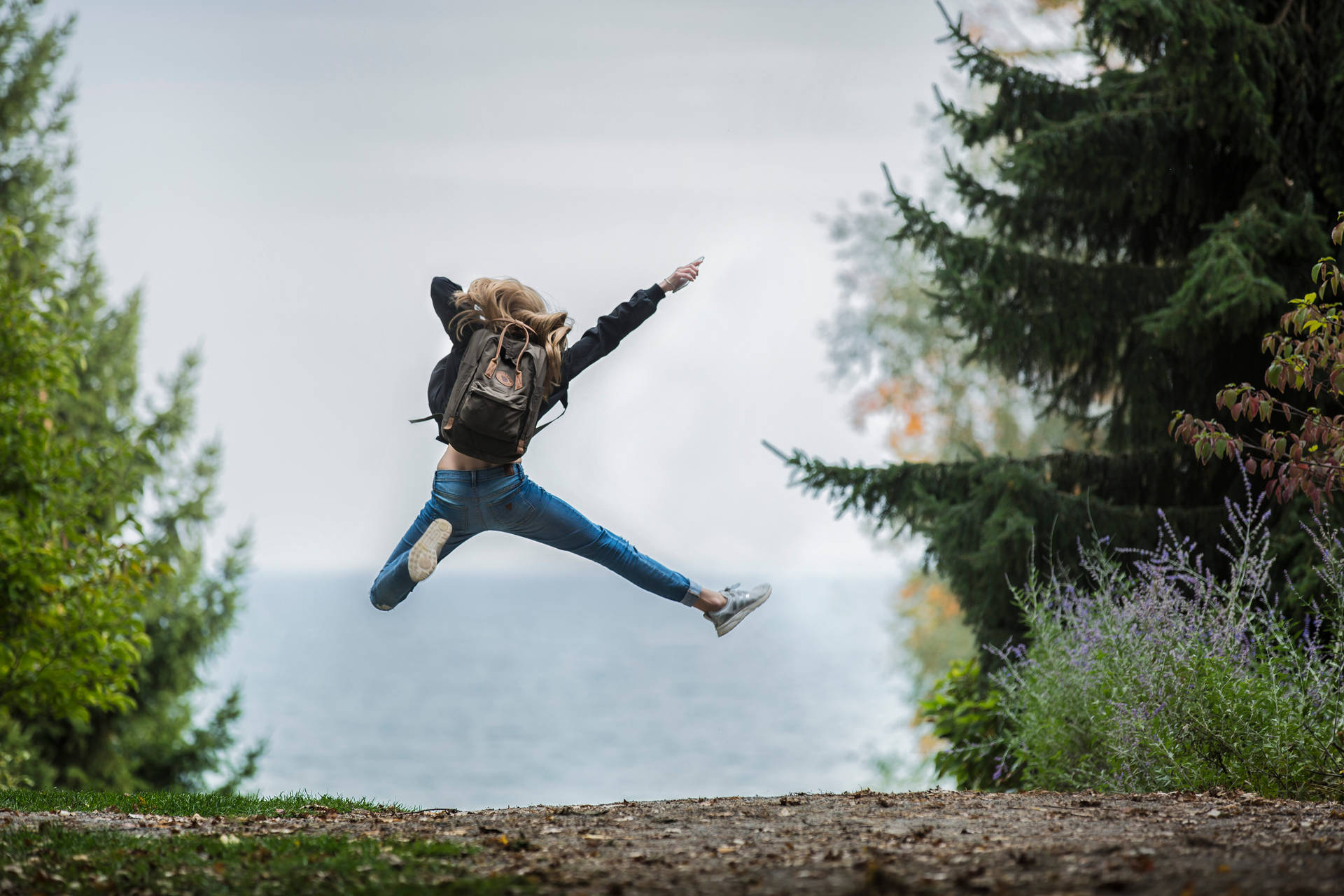 Jumping Girl Excited Wallpaper Background