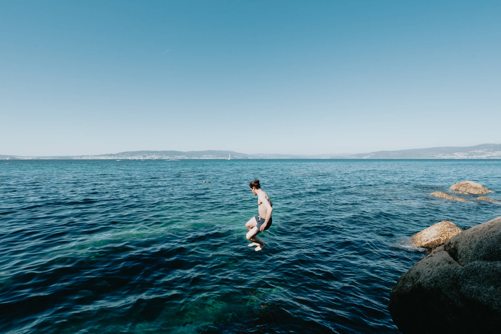 Jumping Into The Blue Ocean Background