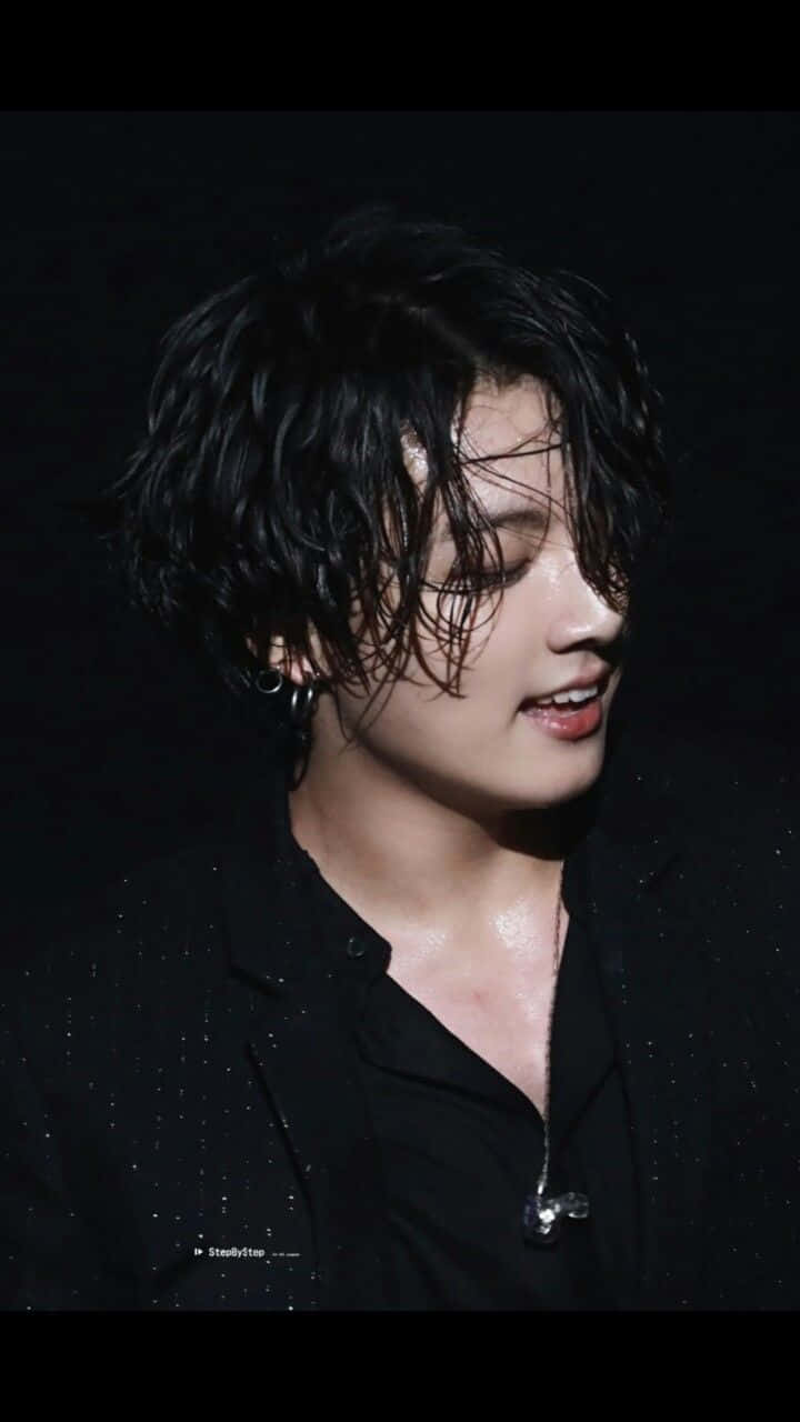Jungkook From South Korean Boy Band Bts Pictured With Long Hair Background