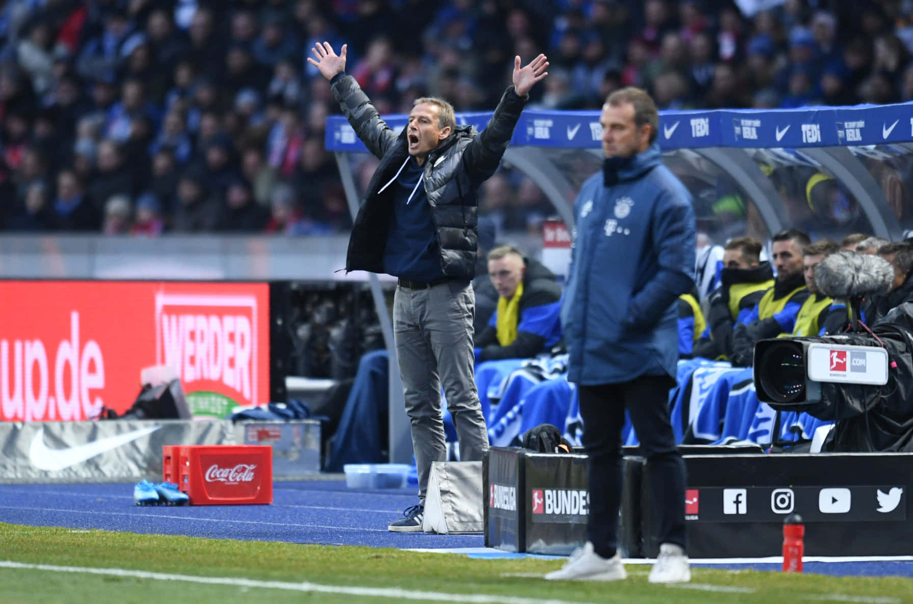 Jurgen Klinsmann Raising Arms Background