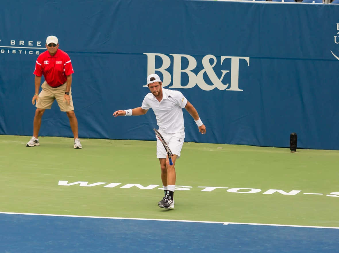 Jurgen Melzer Throwing His Tennis Racket Background