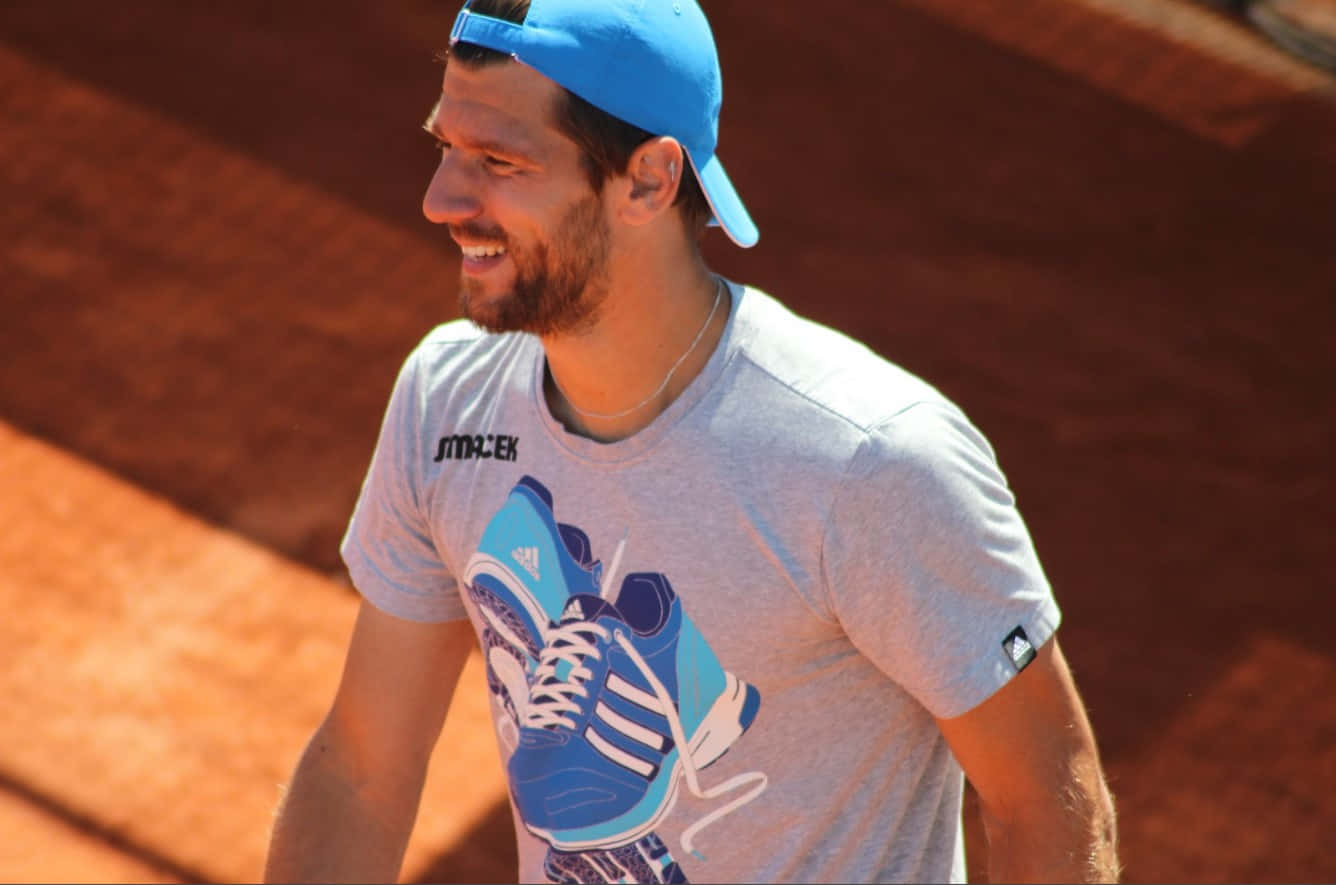 Jurgen Melzer With Blue Cap Background