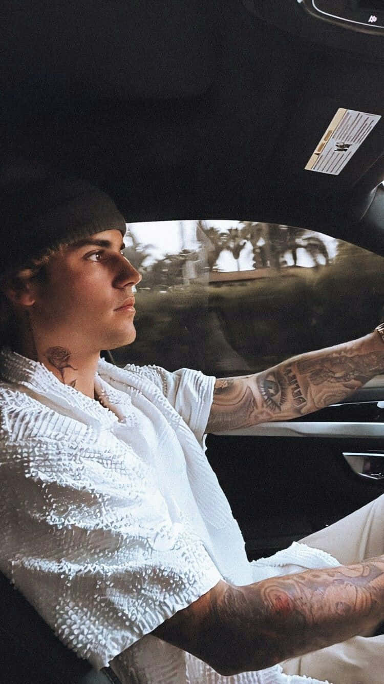 Justin Bieber Embracing His Creative Side Background