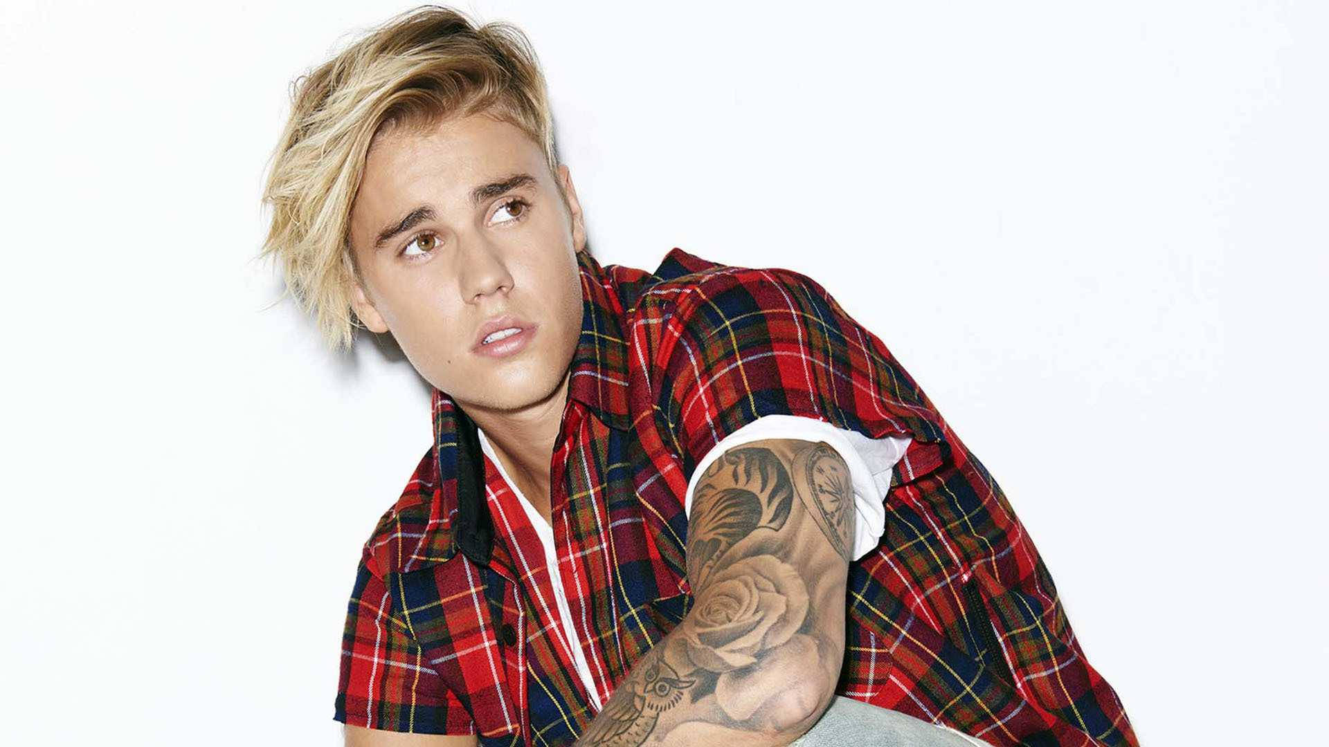 Justin Bieber In A Red Flannel Background