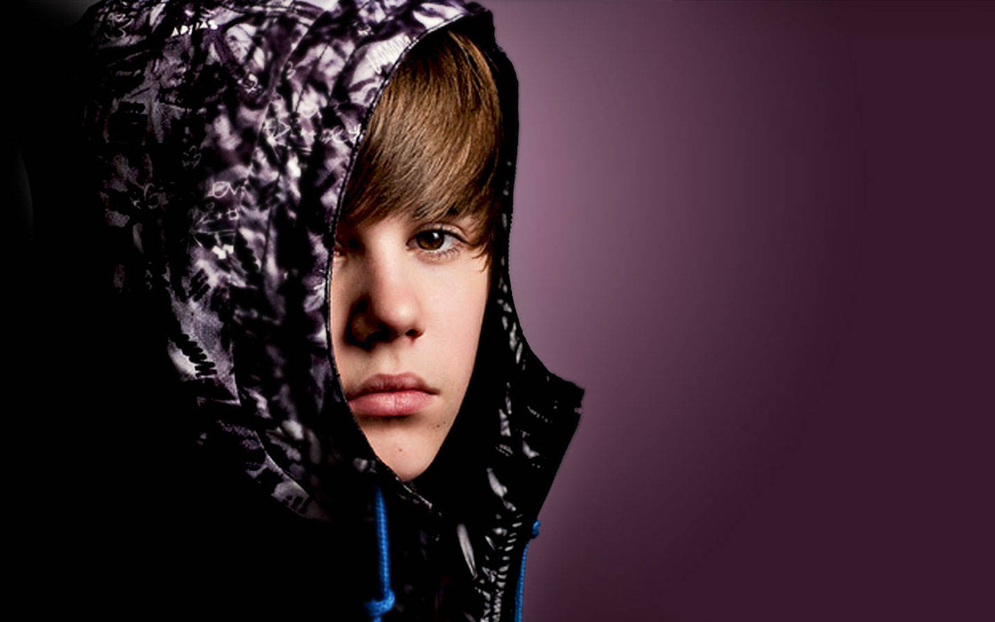 Justin Bieber Rocks A Purple Hoodie Background