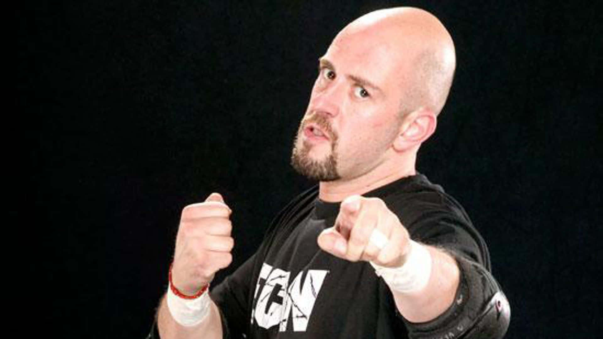 Justin Credible Expressively Pointing With Gesturing Hand Background