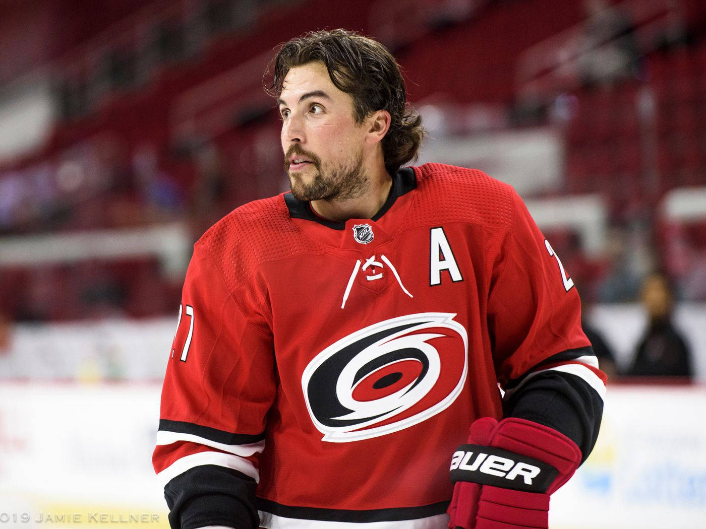 Justin Faulk In Red Jersey Background