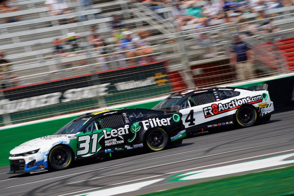 Justin Haley Speeding On The Race Track. Background