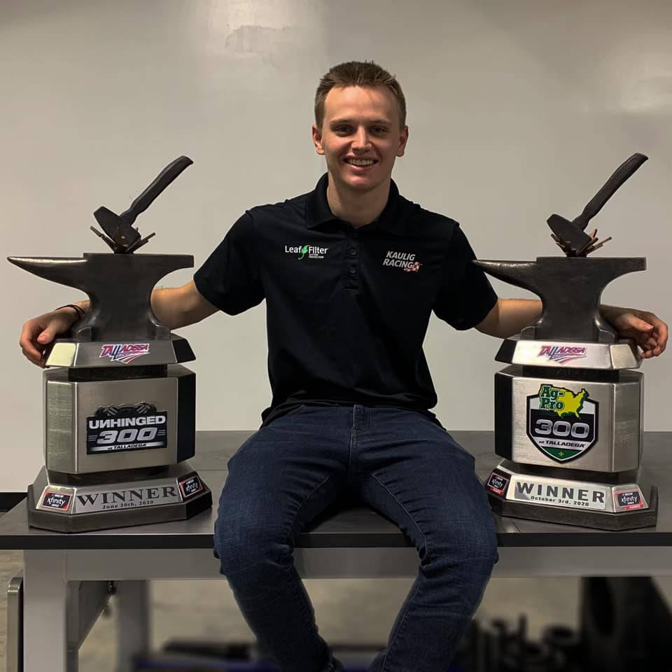 Justin Haley With Trophies Background