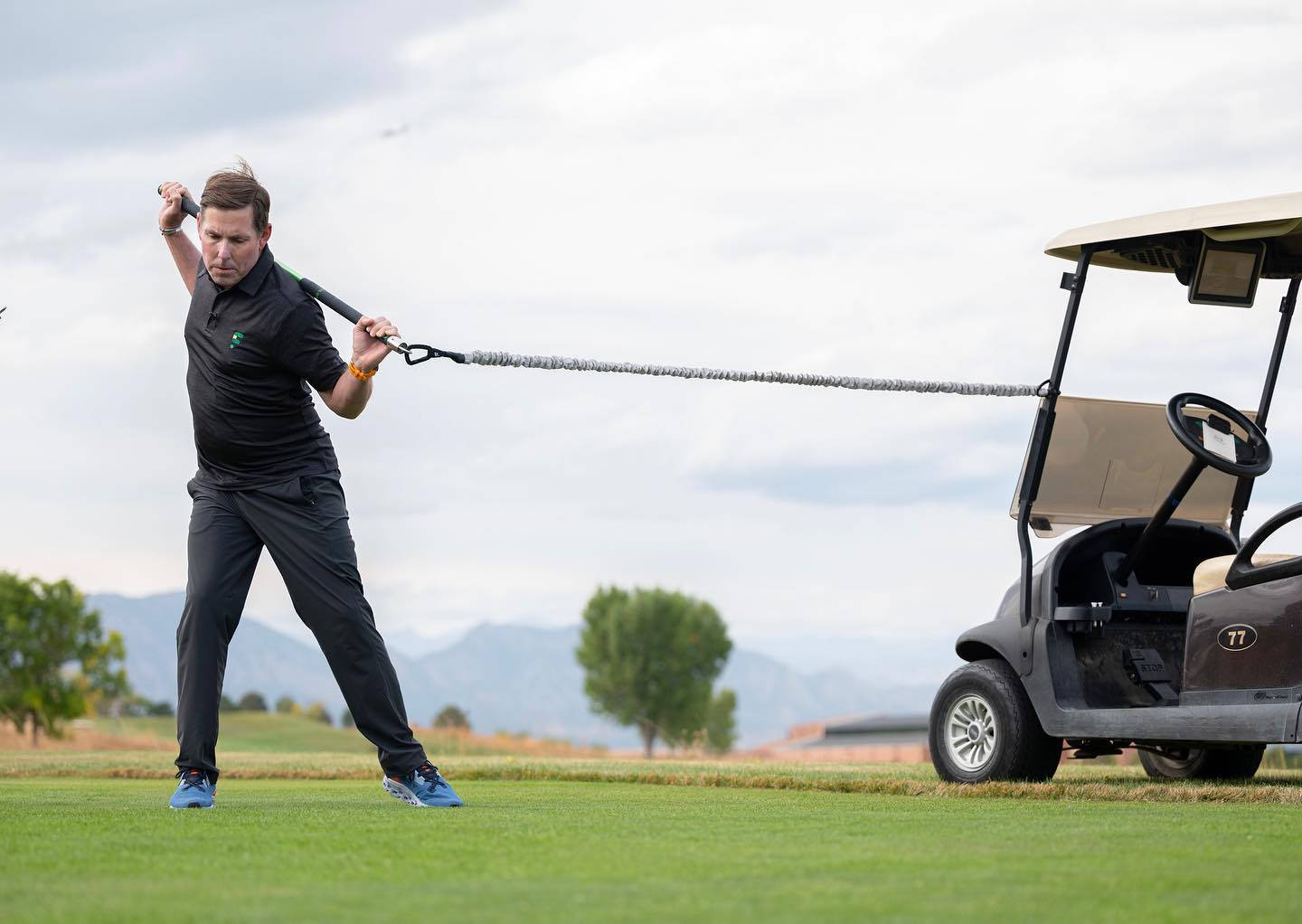 Justin Leonard Stretching On Course Background