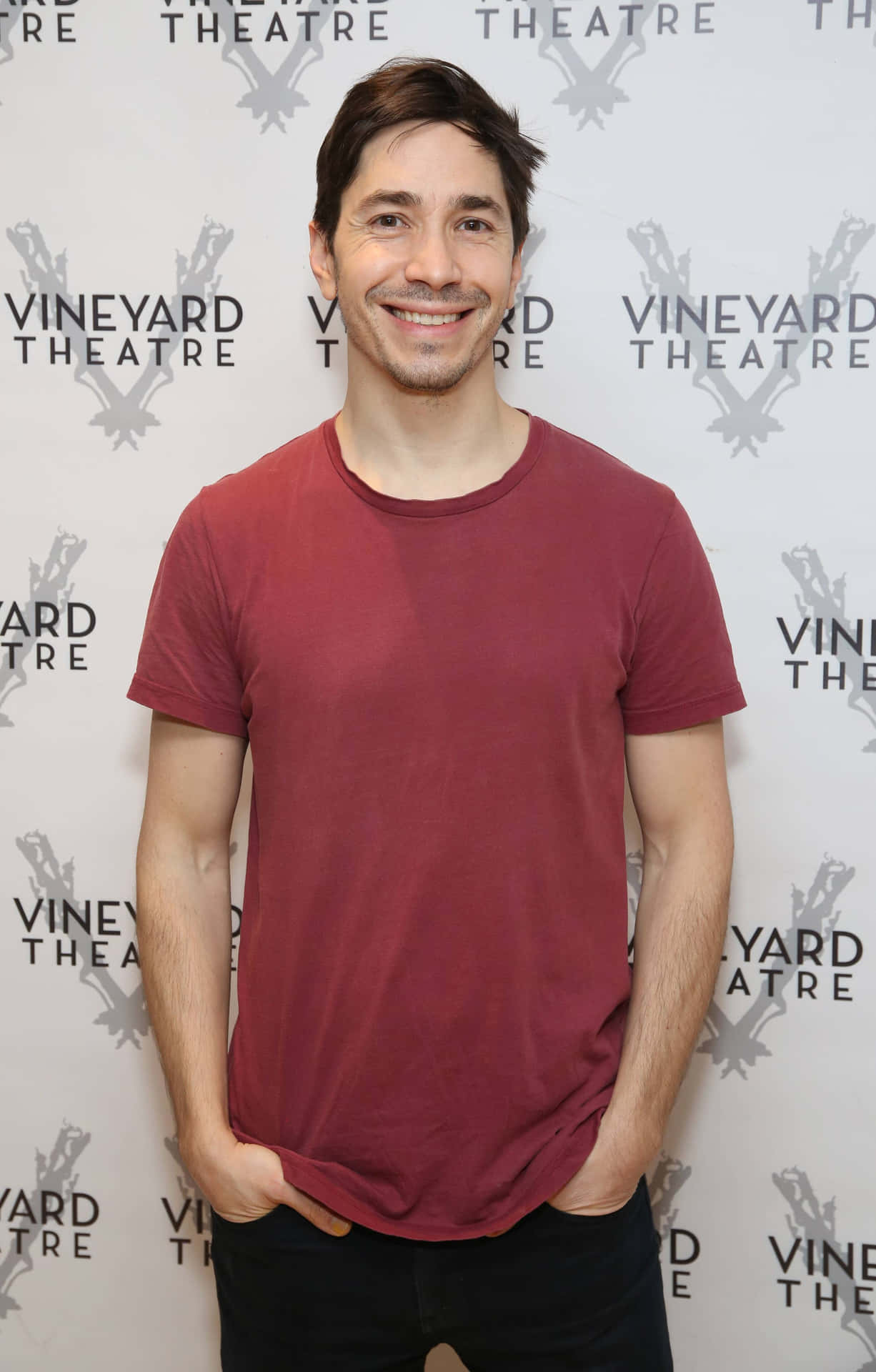 Justin Long On The Red Carpet Looking Confident And Stylish Background