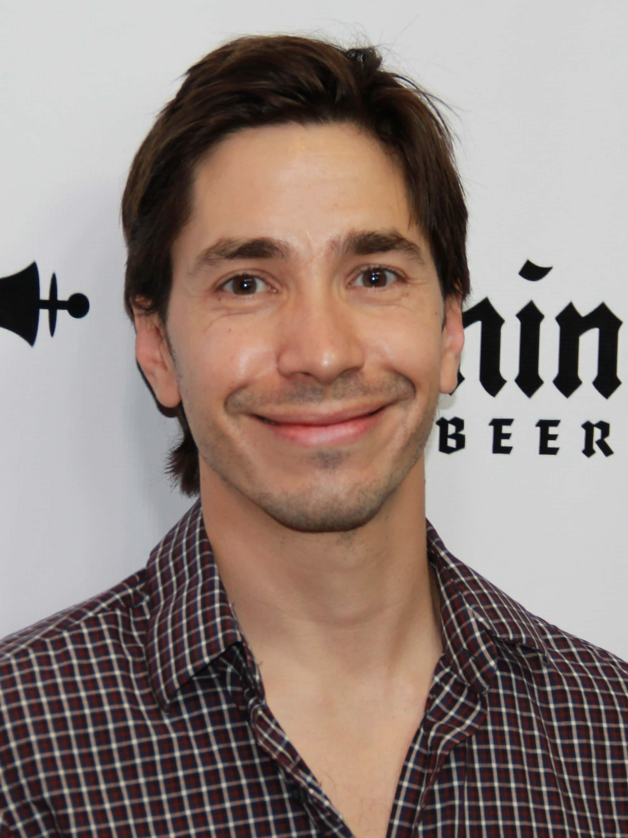 Justin Long Posing With A Confident Smile
