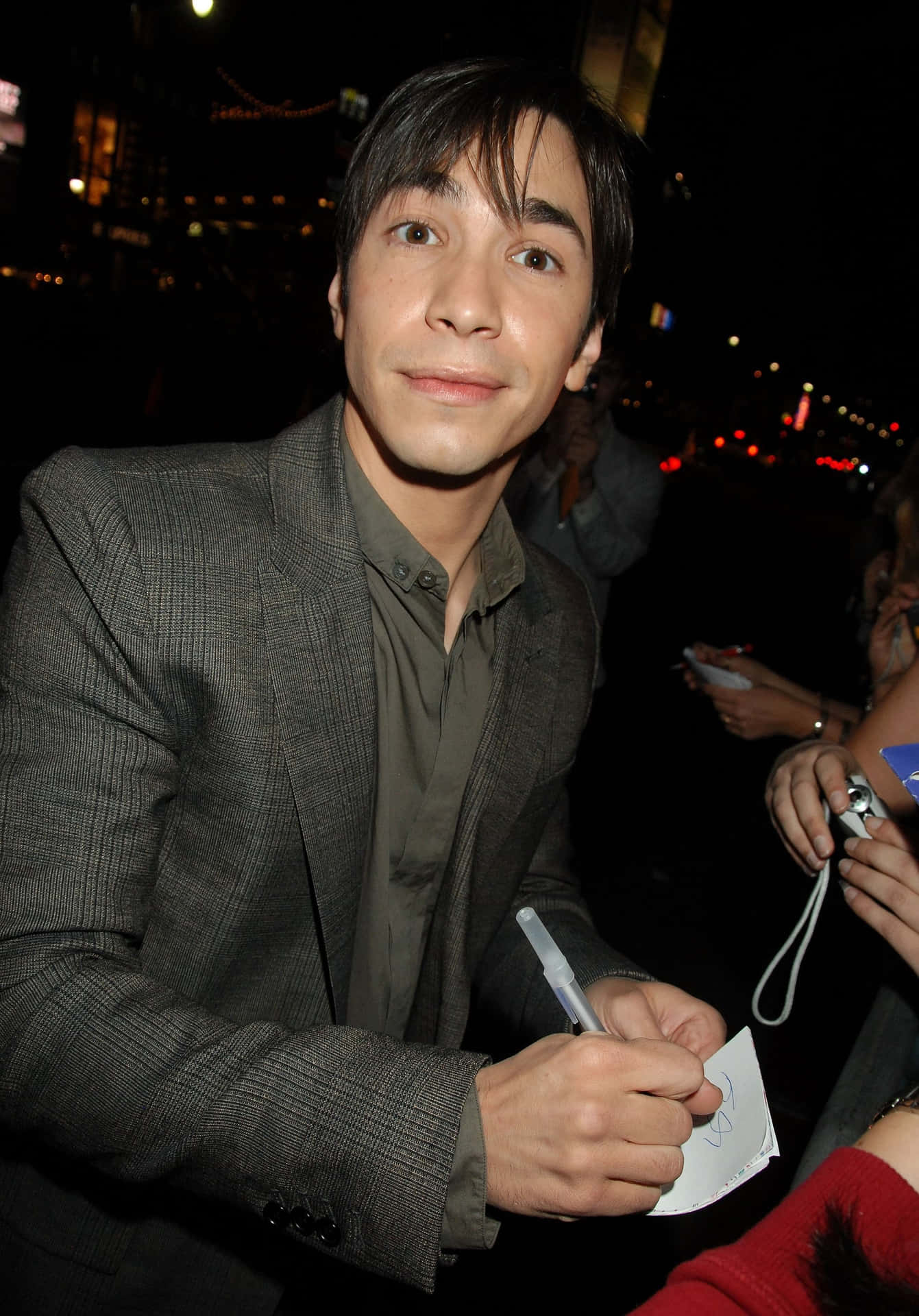 Justin Long Smiling At An Event