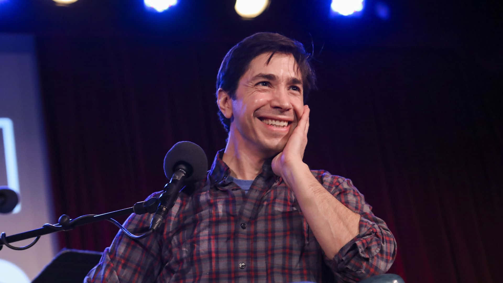 Justin Long Smiling In A Casual Outfit