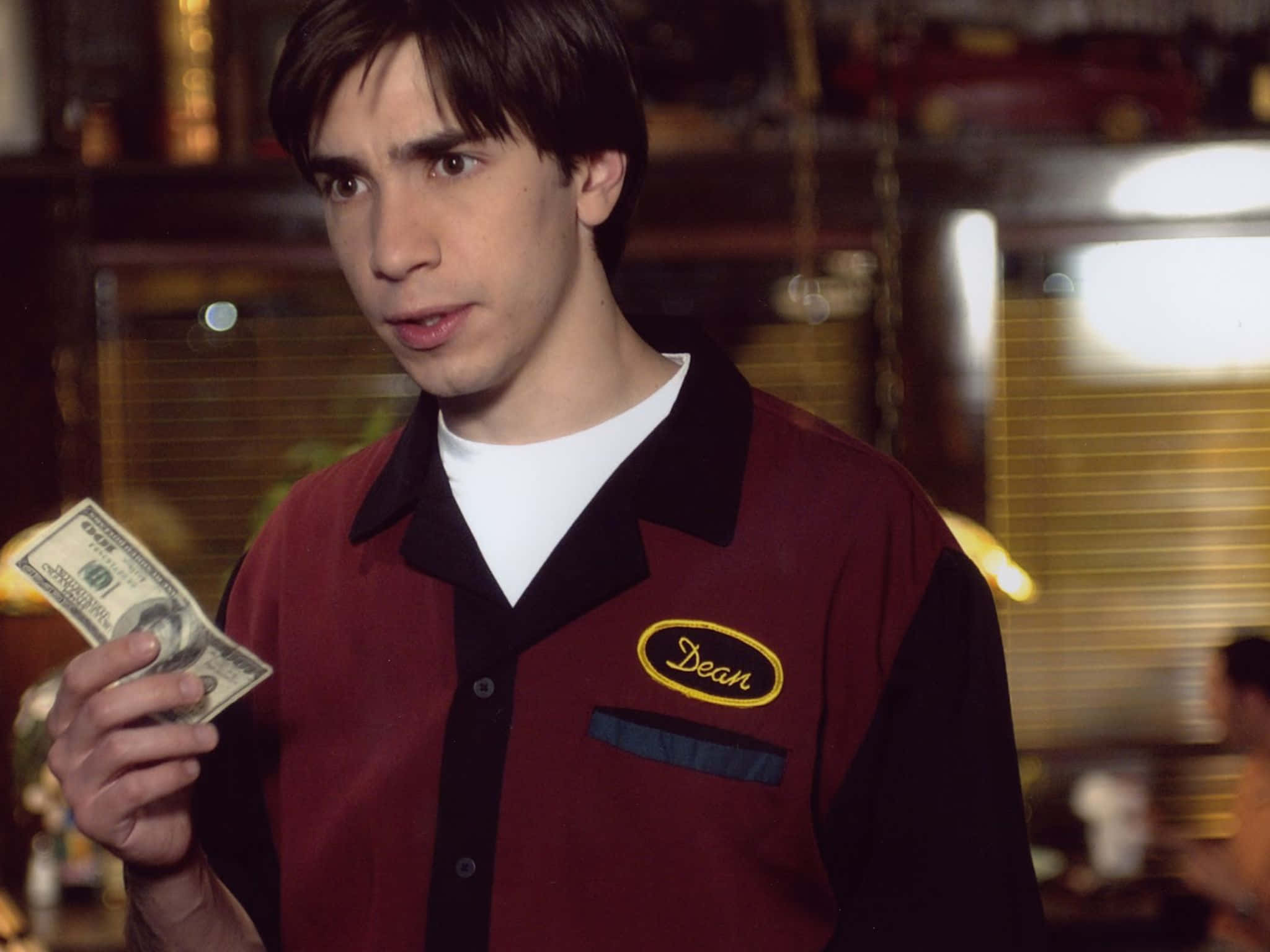 Justin Long Smiling In Casual Style Background