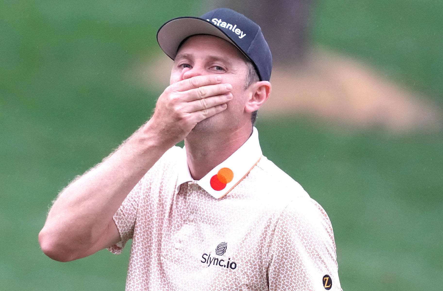 Justin Rose Covering His Mouth