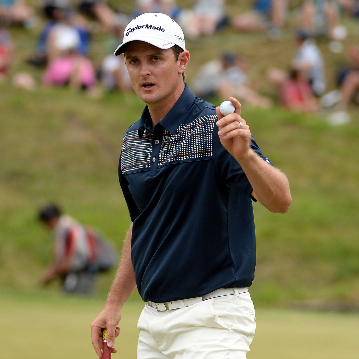 Justin Rose Holding A Golf Ball