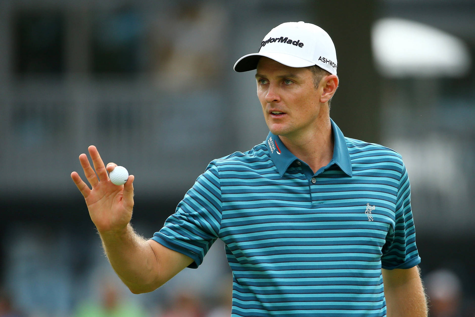 Justin Rose Holding Golf Ball Background