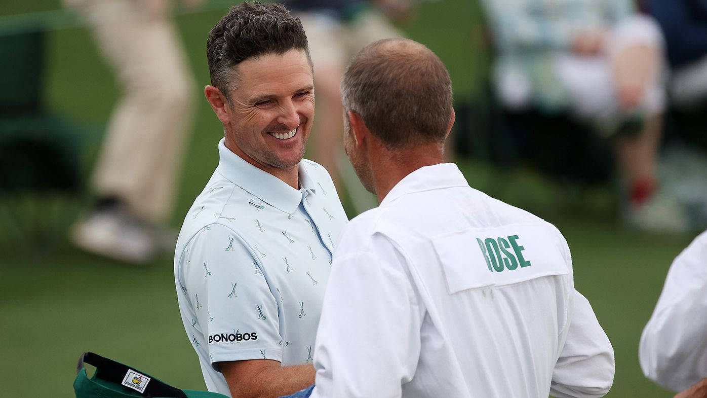 Justin Rose Smiling During A Handshake Background