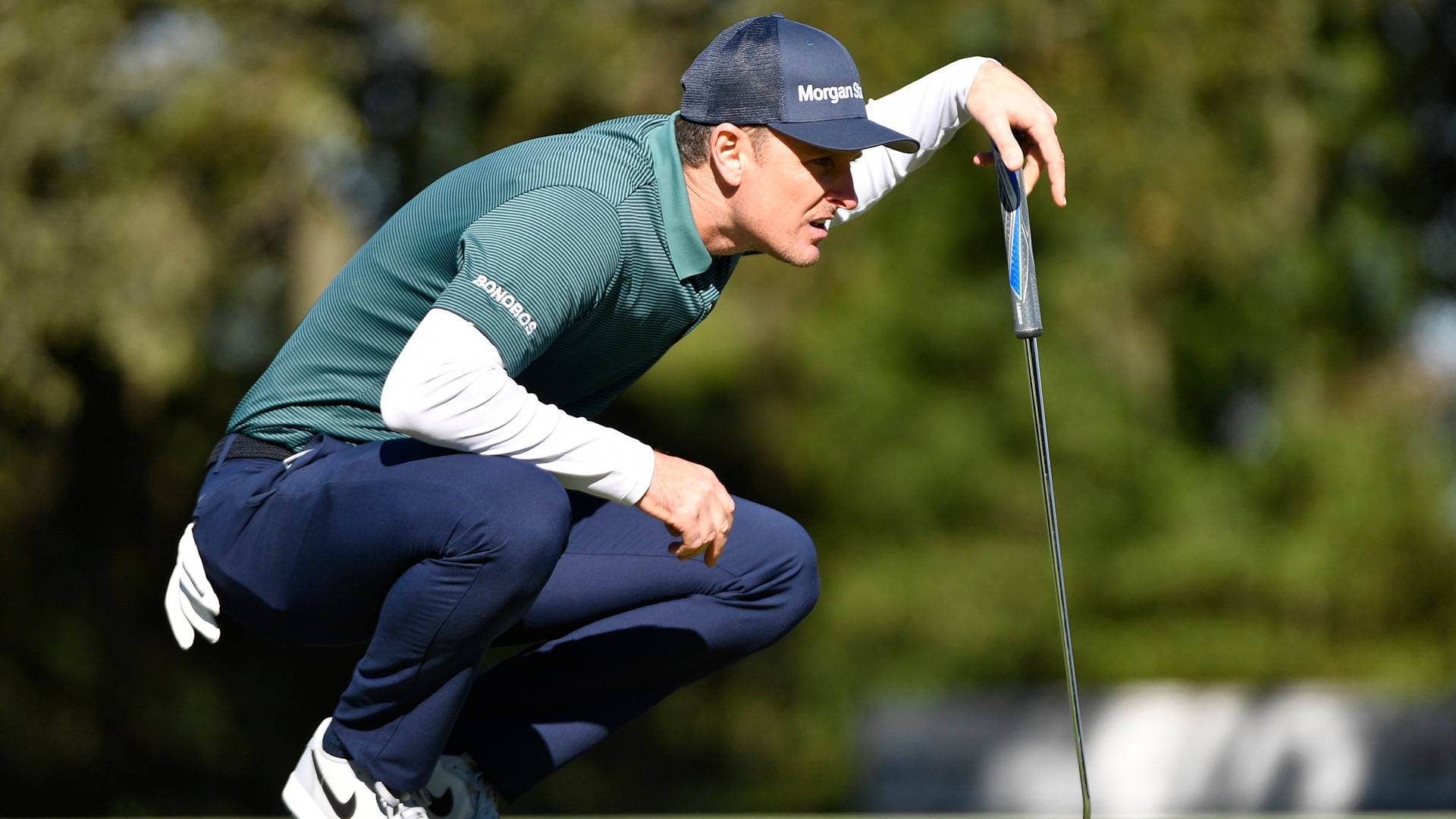 Justin Rose Squatting Background