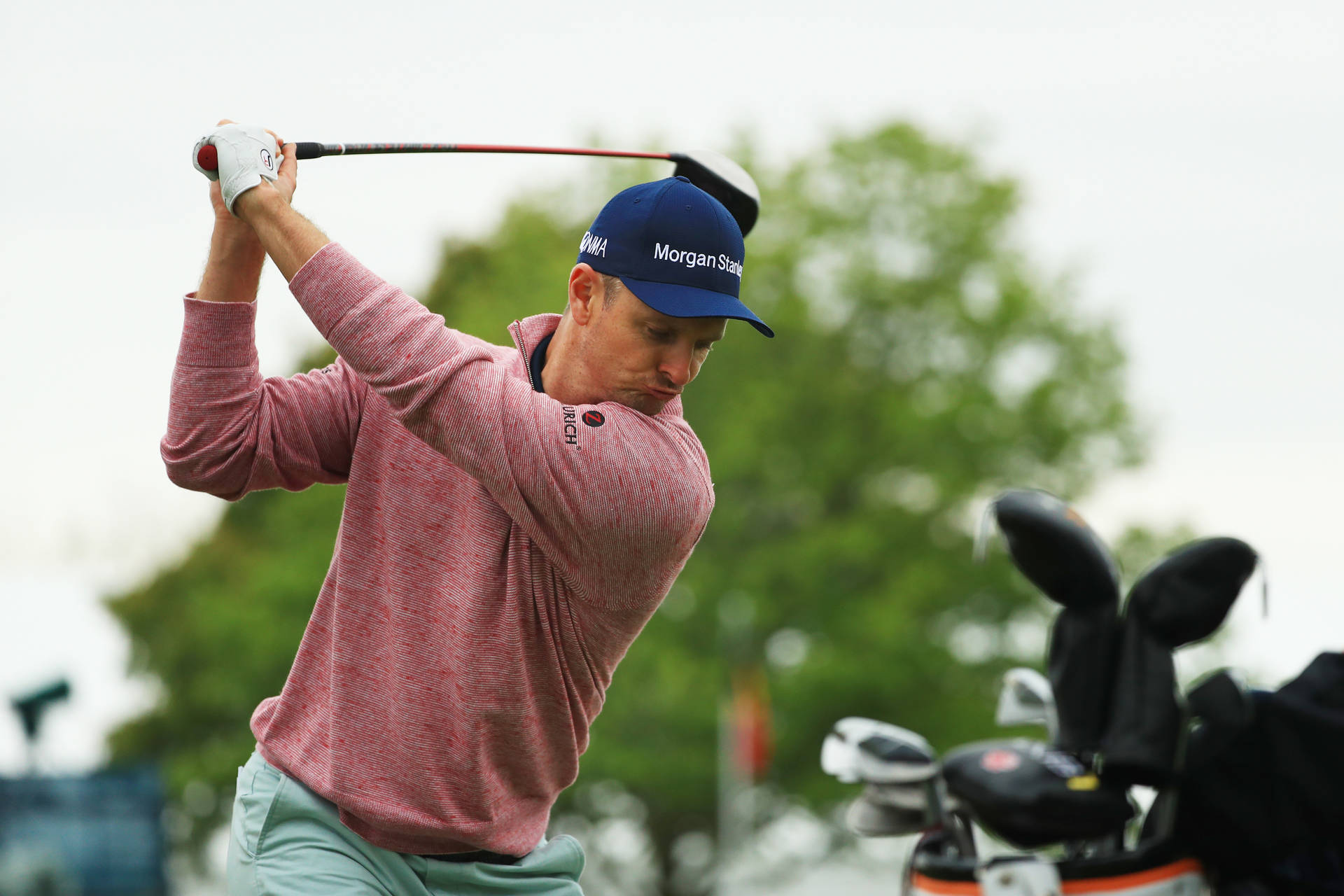 Justin Rose Swinging For A Golf Shot Background