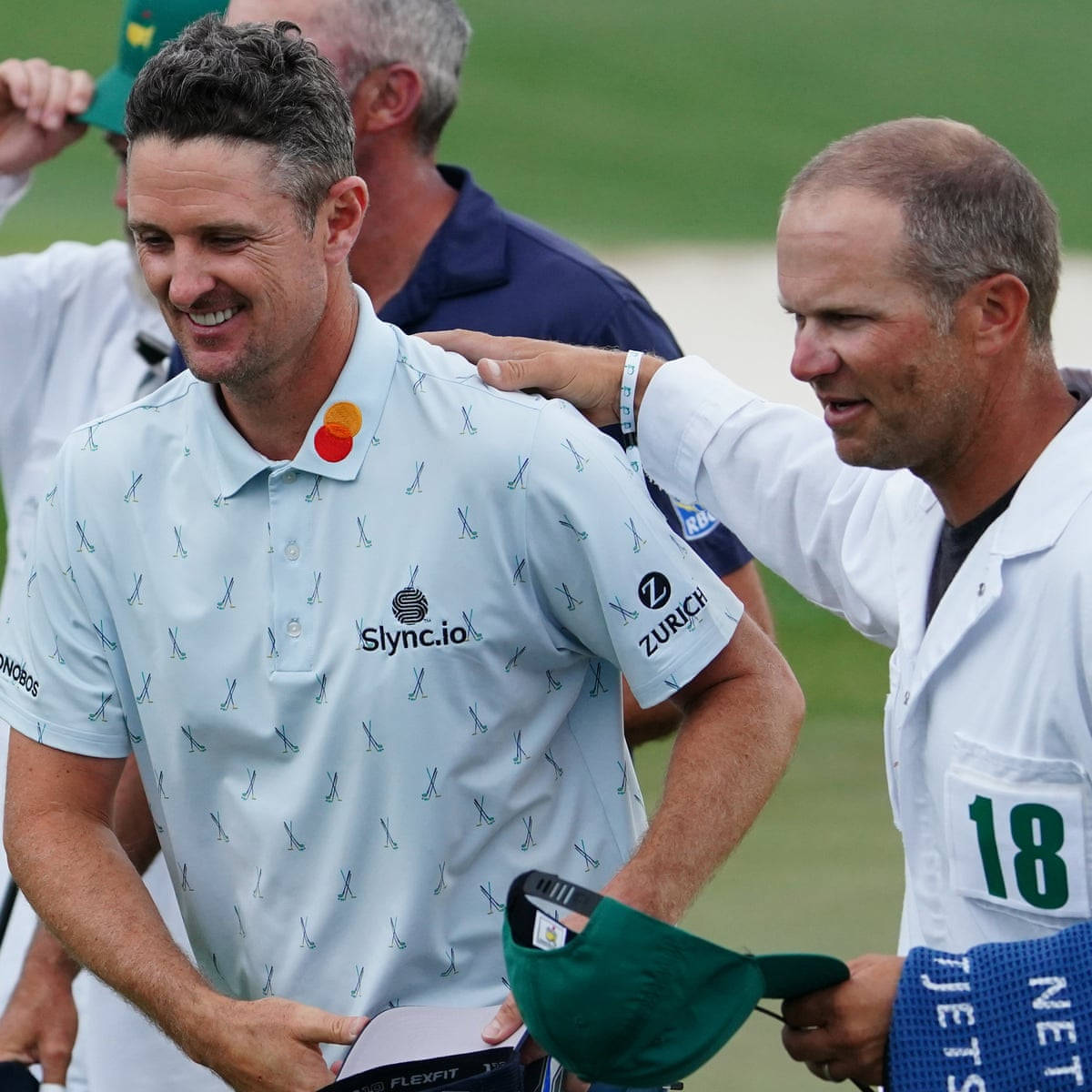 Justin Rose Walking To The Left And Smiling Background