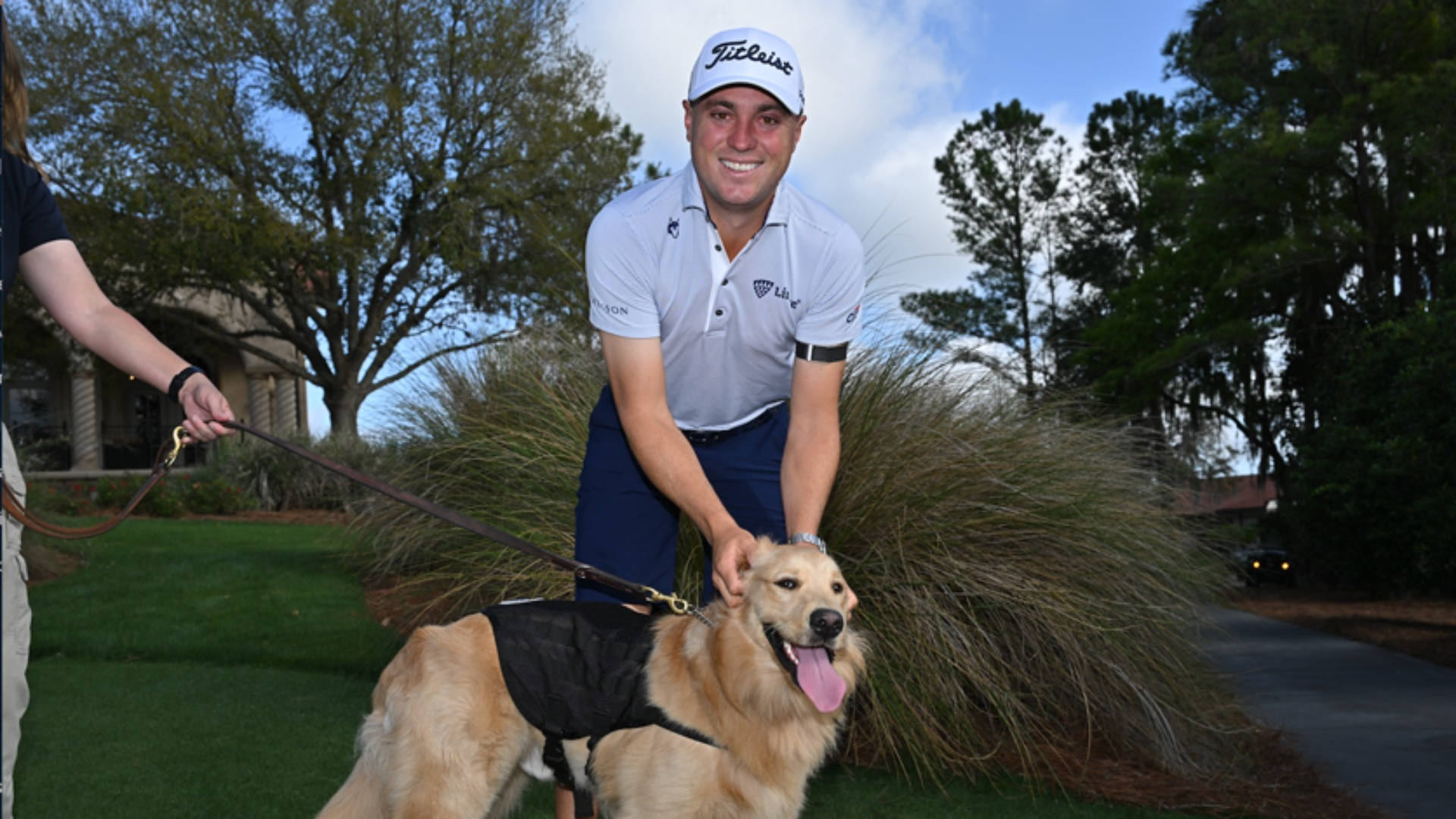 Justin Thomas With Golden Retriever Background