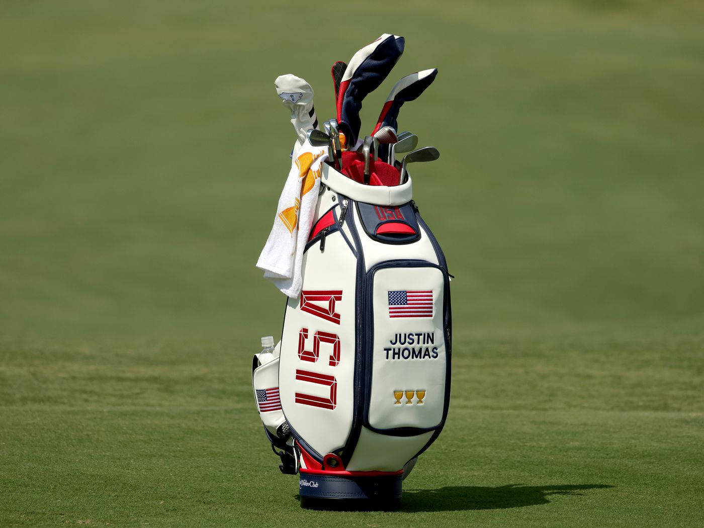 Justin Thomas With His Golf Bag On-course Background