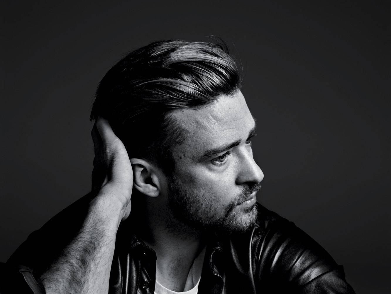 Justin Timberlake Styling His Slick Hair Background