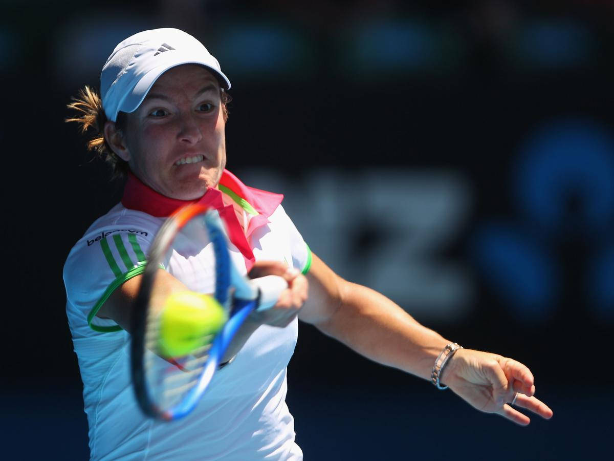 Justine Henin Playing At Australian Open 2004 Background