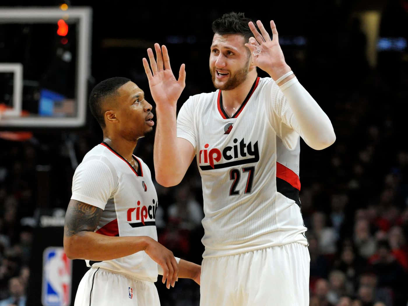 Jusuf Nurkic And Damian Lillard On The Court Background