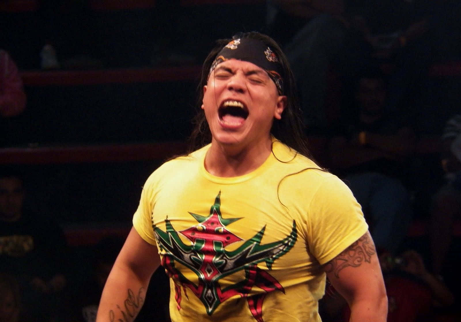 Juventud Guerrera Reacts During Match Background