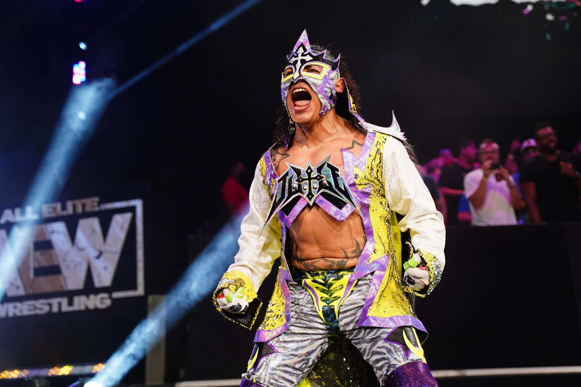 Juventud Guerrera Wearing Luchador Outfit At Aew Background