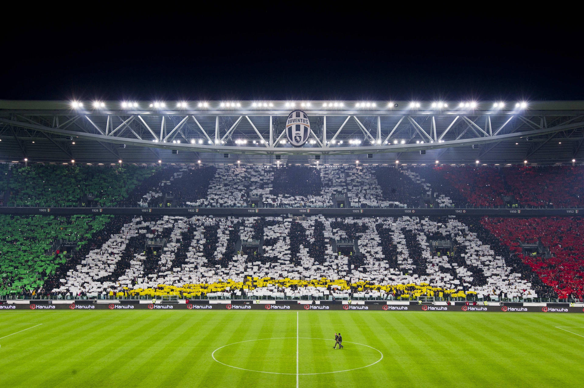 Juventus Die-hard Supporters At Stadium Background