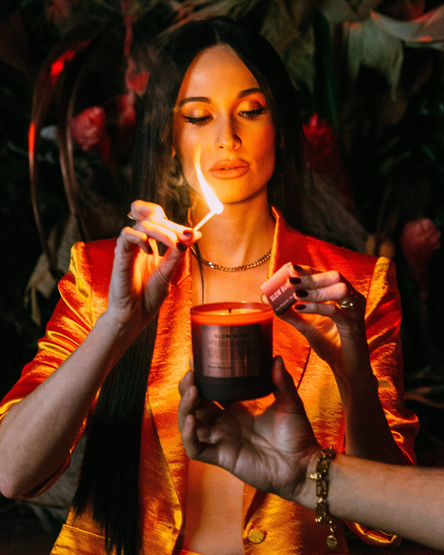 Kacey Musgraves Lighting Candle