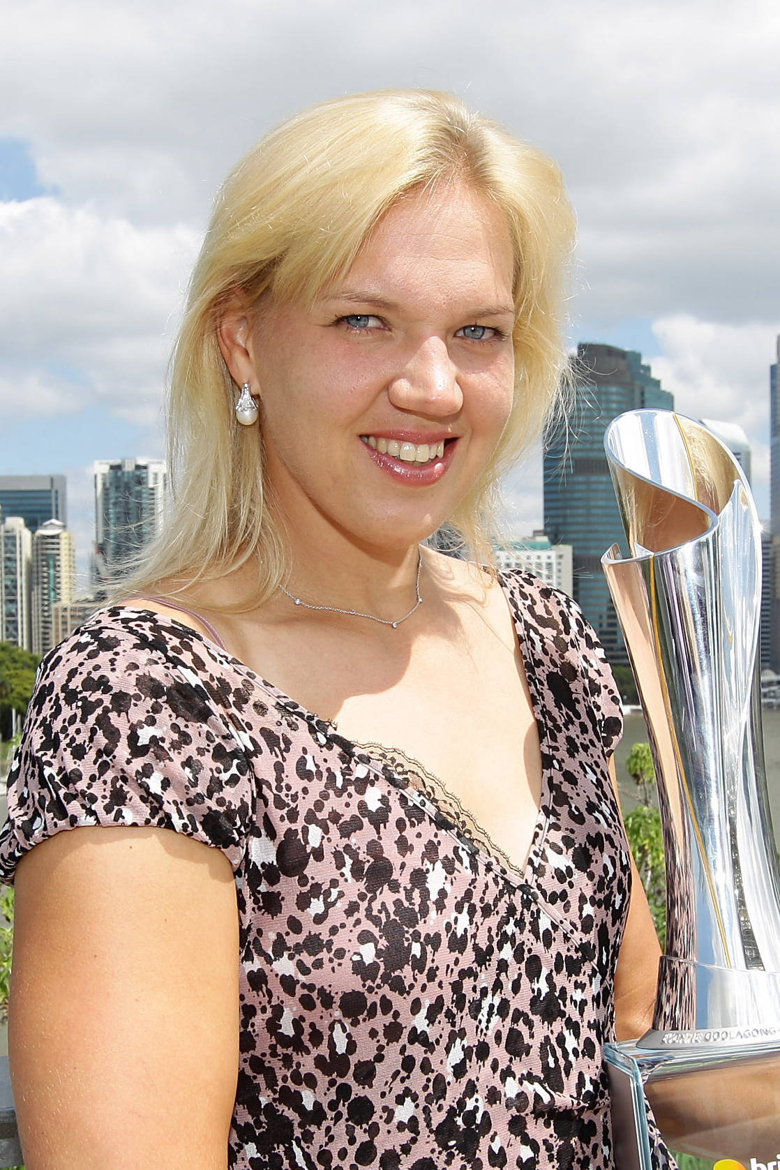 Kaia Kanepi - Champion With Trophy Background