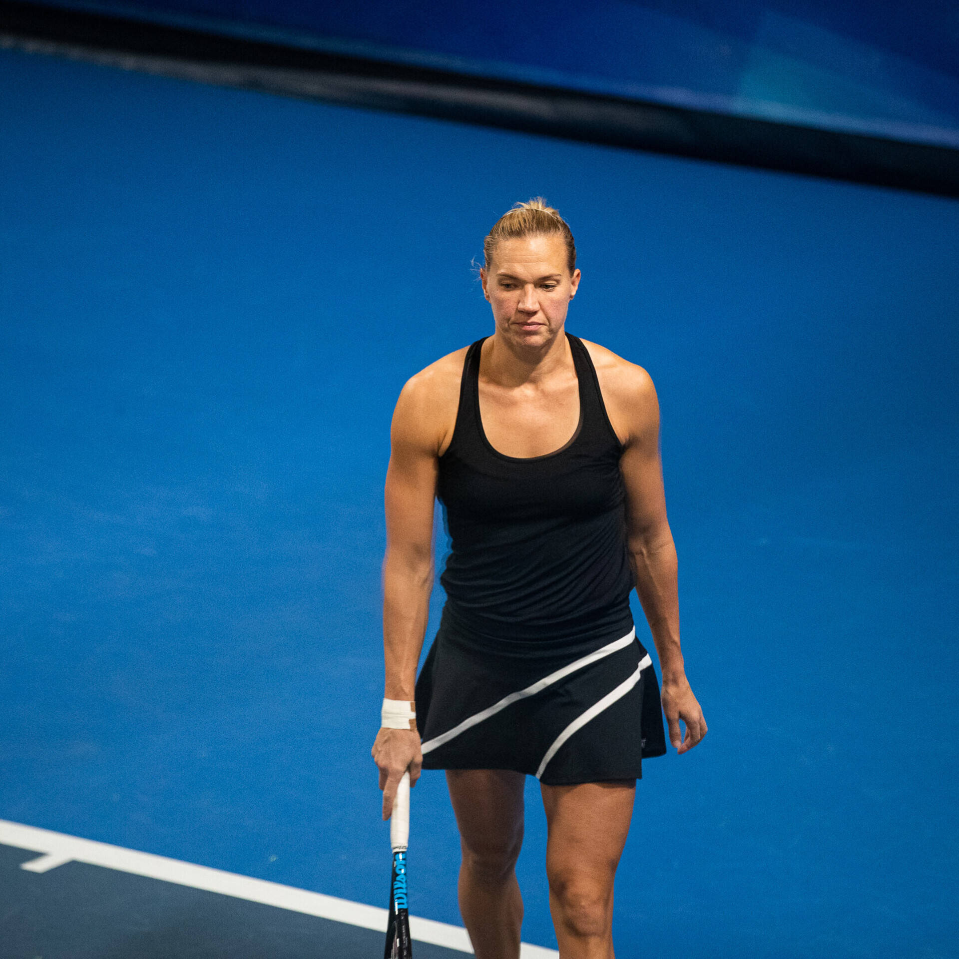 Kaia Kanepi In An All-black Tennis Outfit Background