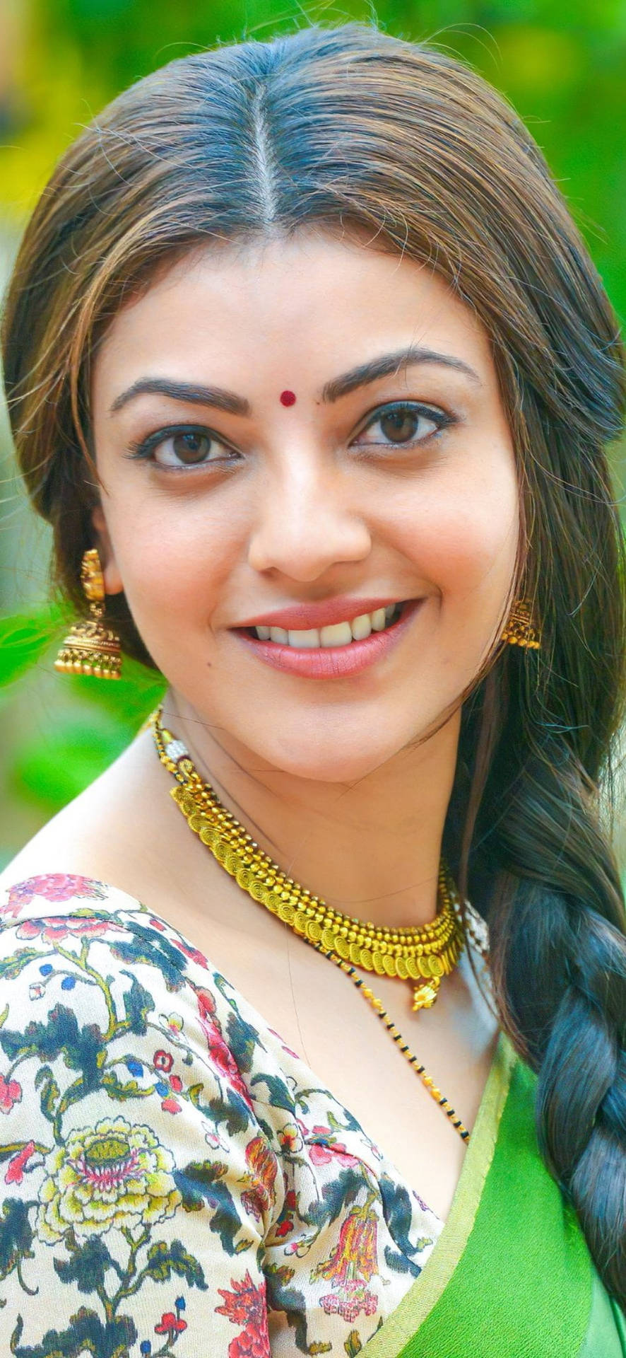 Kajal Agarwal Glamorously Shining In Hd With Gold Accessories Background