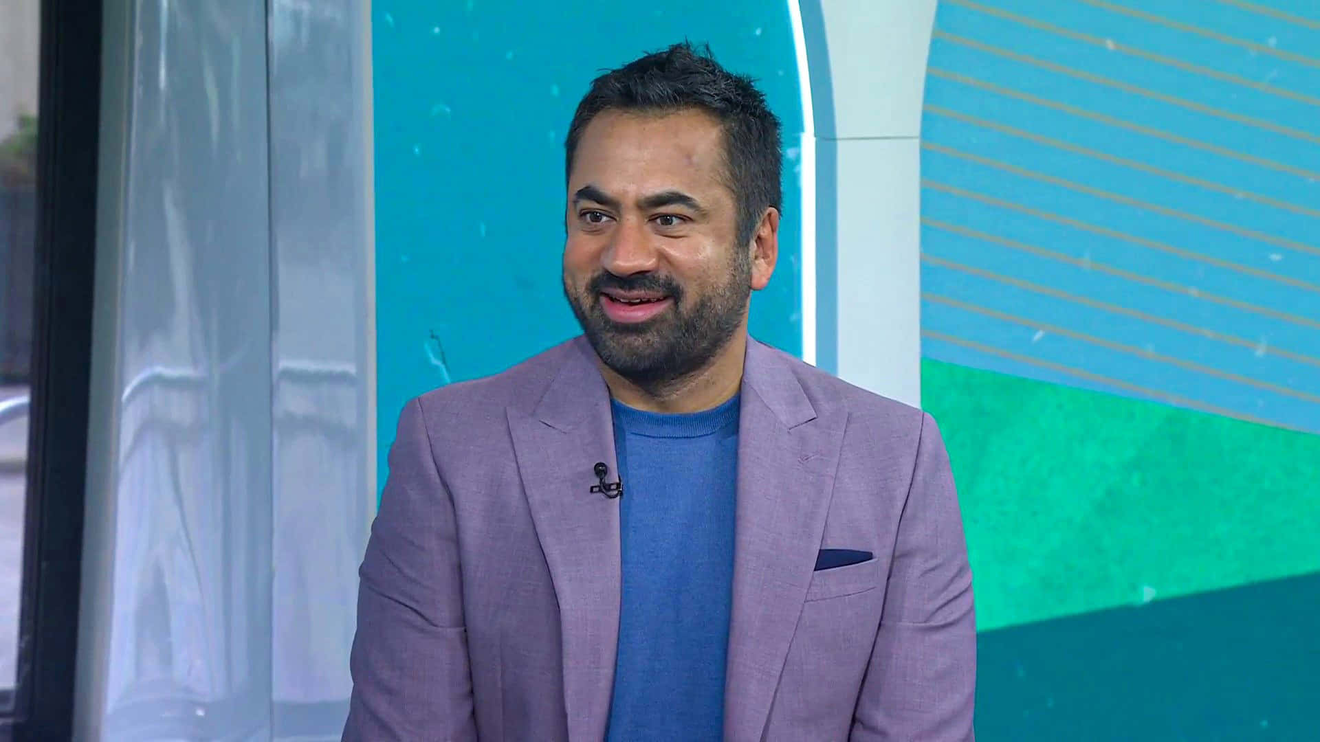 Kal Penn Posing In A Candid Moment