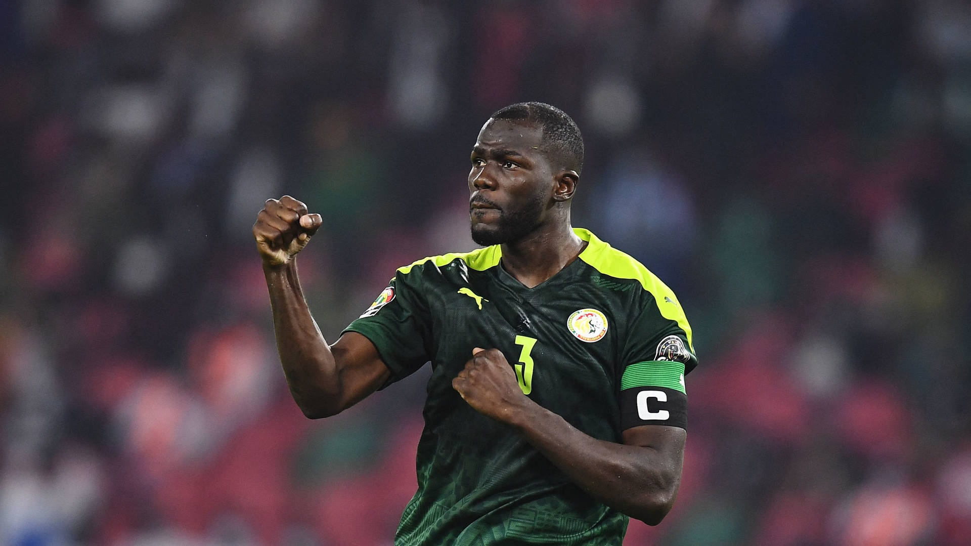 Kalidou Koulibaly Hand Sign Background