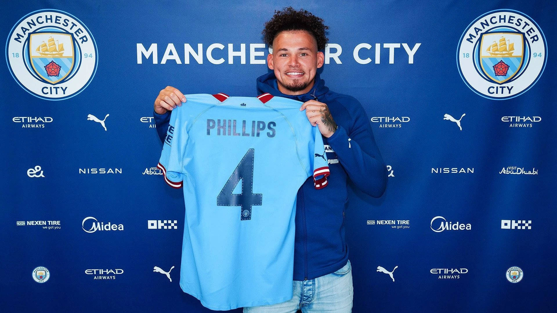 Kalvin Phillips Holding Jersey Background