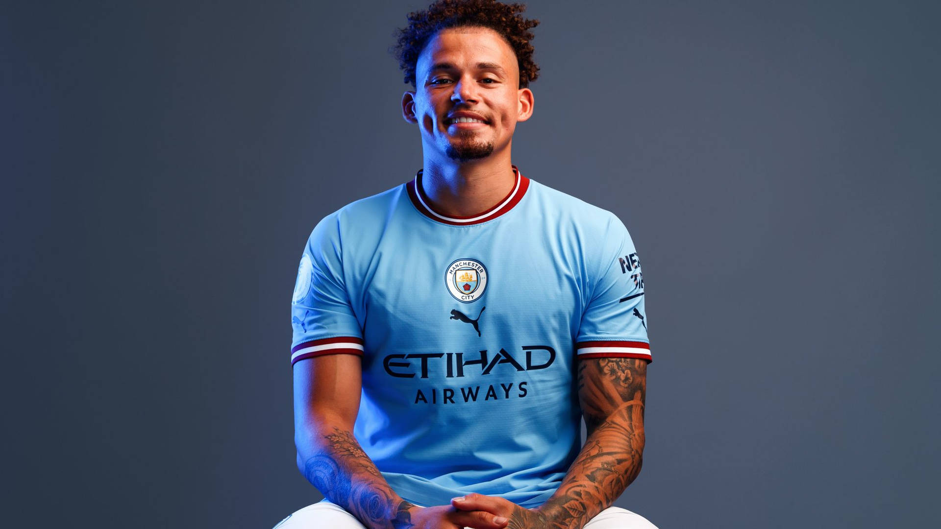 Kalvin Phillips Sitting Gray Background