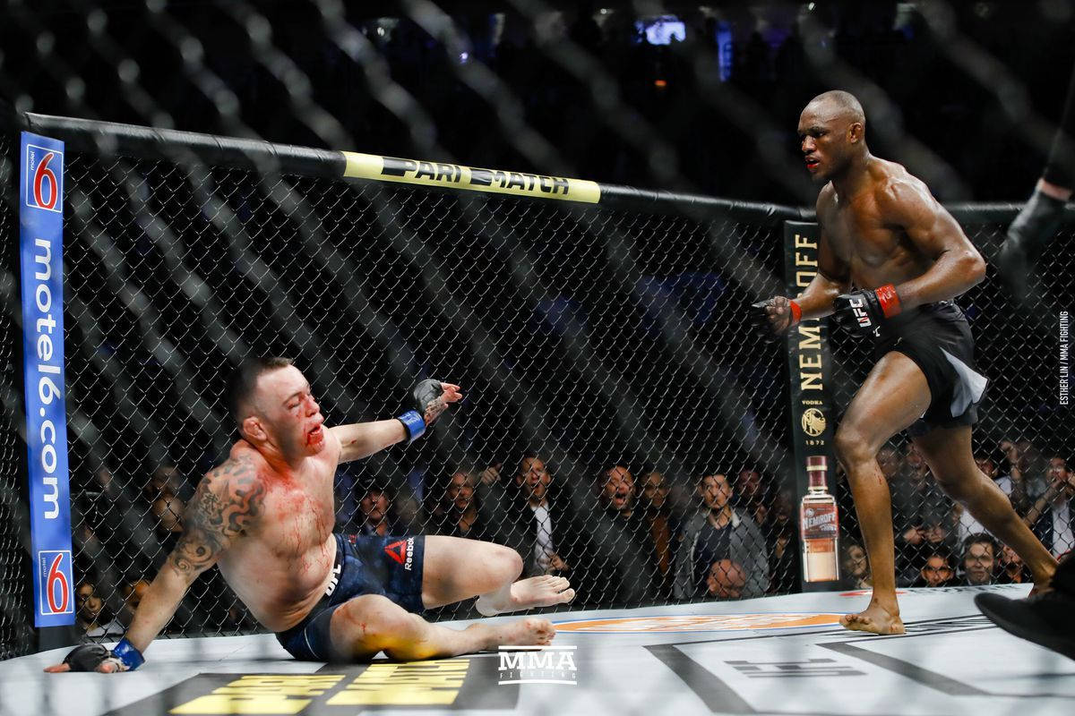 Kamaru Usman Knocked Down Opponent Background