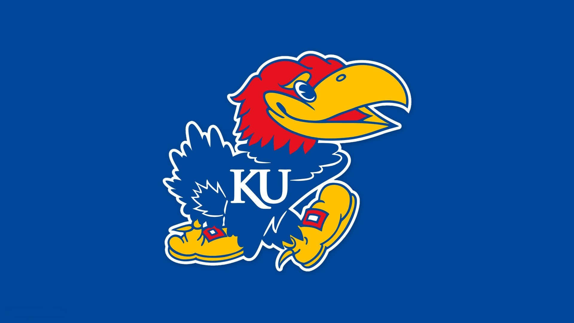 Kansas Jayhawks Basketball Team Showcases Their Skills During A Game Background