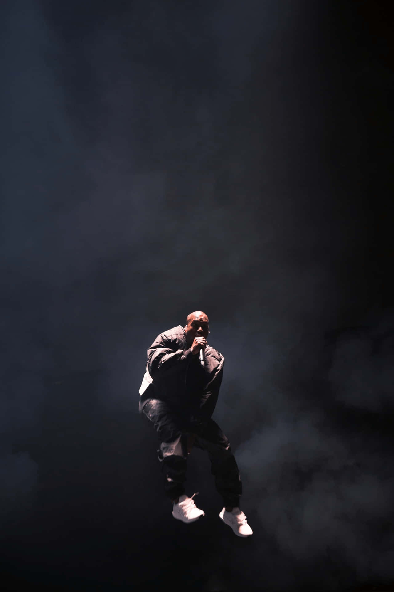 Kanye West Unveils His Sleek New Line Of Iphones. Background