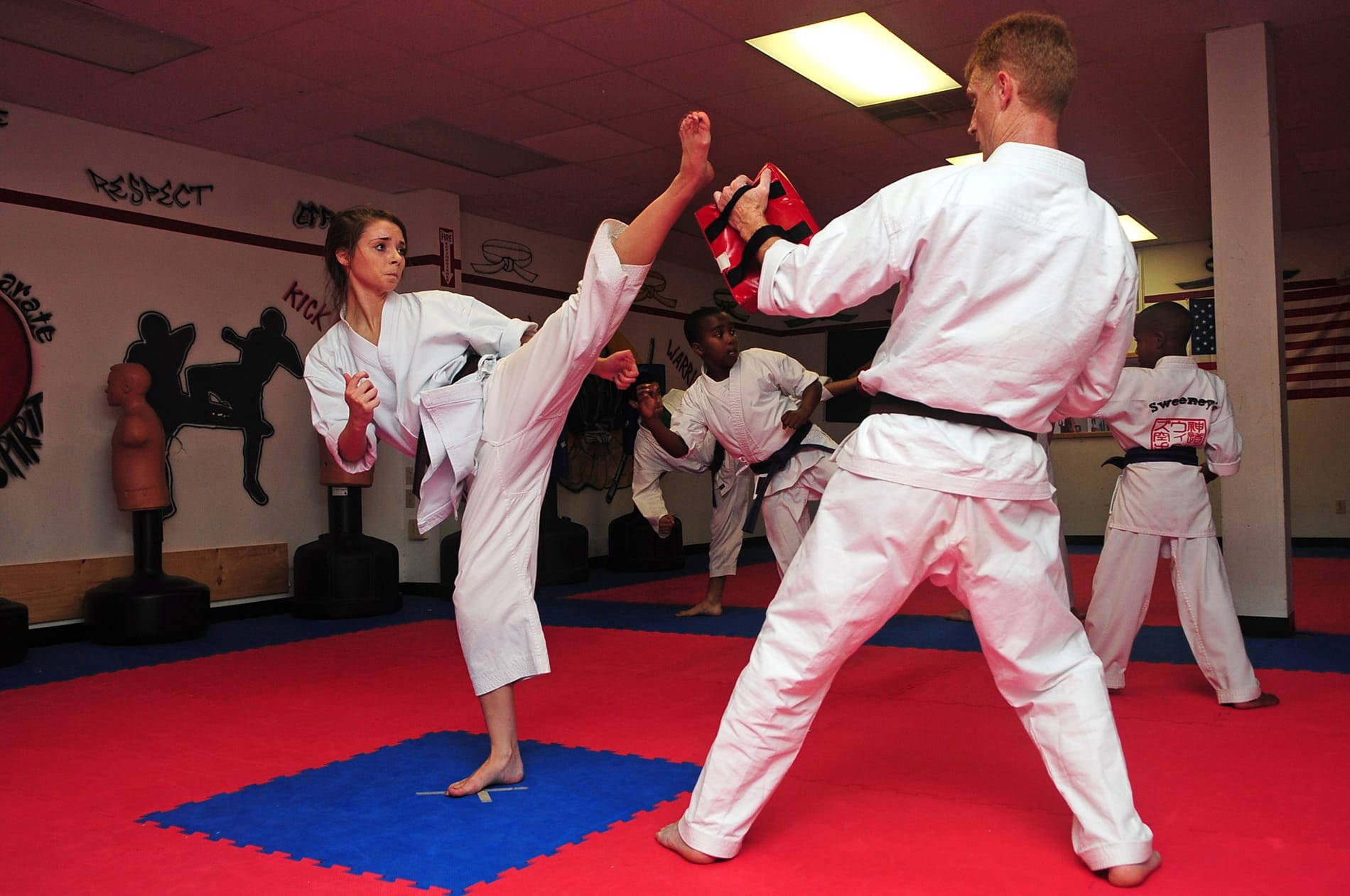 Karate Kick With Sensei At Dojo