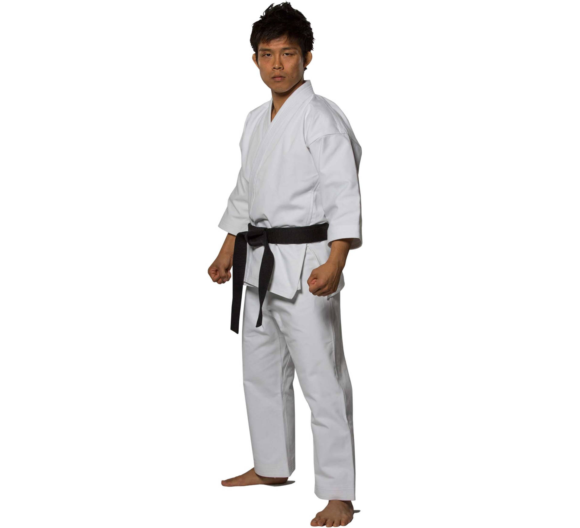 Karate Man In Karate Uniform On White Background