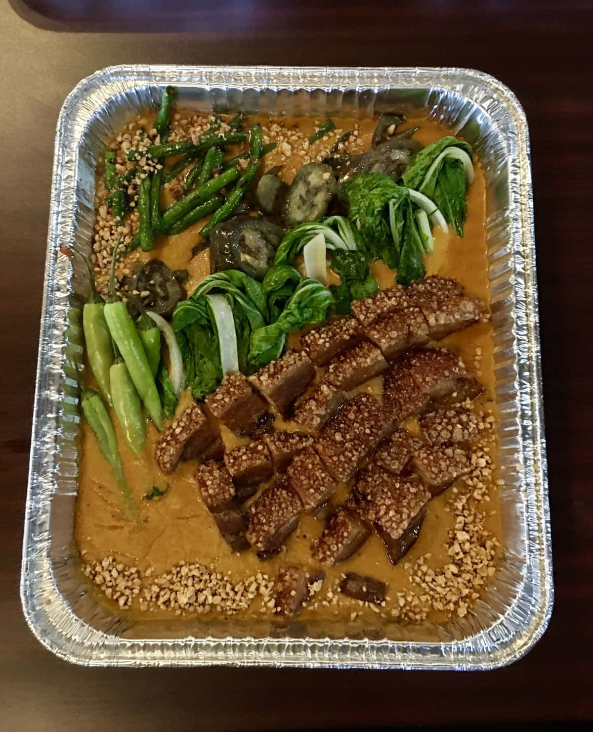 Kare-kare In An Aluminum Foil Tray Background